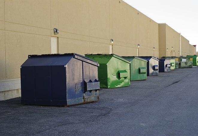 red and green waste bins at a building project in Castlewood